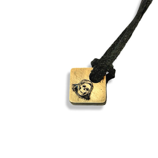 OG GHOUL PENDANT ON LEATHER